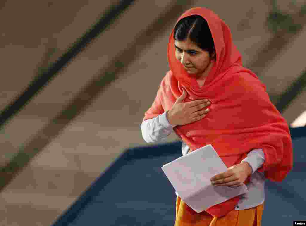 Nobel Peace Prize laureate Malala Yousafzai prepares to deliver her speech during the Nobel Peace Prize awards ceremony at the City Hall in Oslo, Dec. 10, 2014.