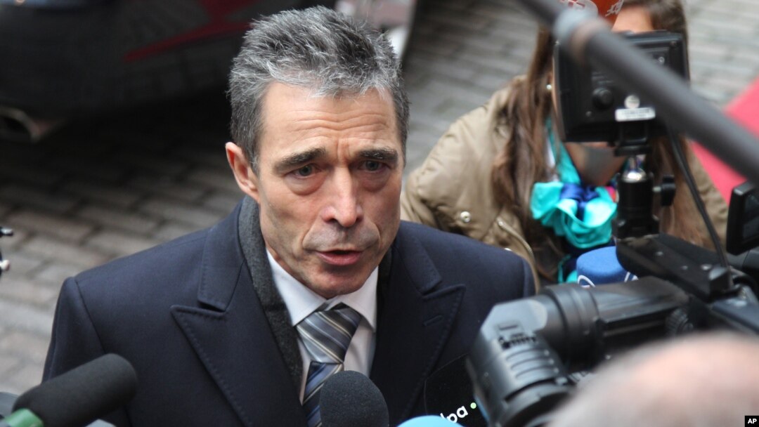 NATO Secretary General Anders Fogh Rasmussen answers questions by journalists, prior to the start of the EU foreign and defense ministers meeting at the European Council building in Brussels, November 19, 2012.
