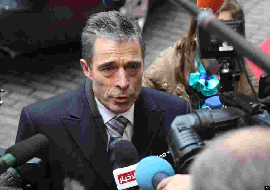 NATO Secretary General Anders Fogh Rasmussen answers questions by journalists, prior to the start of the EU foreign and defense ministers meeting at the European Council building in Brussels, November 19, 2012.