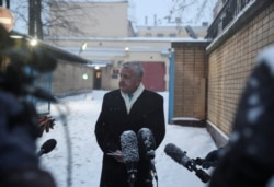 U.S. ambassador to Russia John Sullivan speaks with journalists after his meeting with Paul Whelan, a U.S. national arrested and accused of espionage, outside a detention centre in Moscow, Russia January 30, 2020.