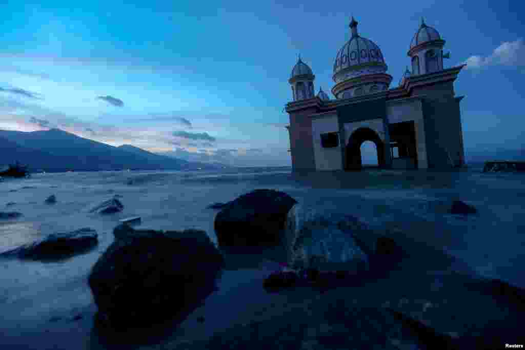 Remains of a mosque destroyed by the earthquake and tsunami is pictured in Palu, Central Sulawesi, Indonesia.