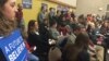 Democrats gather for their caucus, West Des Moines, Iowa, Feb. 1, 2016. (K. Farabaugh/VOA) 