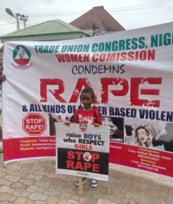 FILE - A young girl joins in an undated anti-rape demonstration organized by the Women Commission of the Trade Union Congress, Nigeria.