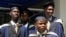 Students of the University of Ibadan check their graduation gowns at their campus in Ibadan, south west Nigeria (2006 file photo).