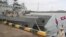 Cambodian navy troop members stand on a navy boat at Ream Naval Base in Sihanoukville, southwestern of Phnom Penh, Cambodia on July 26, 2019. Cambodia's government on Monday, Oct. 5, 2020, officially denied suggestions that its demolition of a U.S.-funded