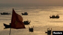 FILE - Fishing boats are seen on bay of Ly Son islands of Vietnam's central Quang Ngai province.