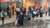 Displaced Palestinians ordered by the Israeli military to evacuate their neighborhoods make their way as they flee amid an Israeli military operation, in Beit Lahiya in the northern Gaza Strip, Oct. 22, 2024. 