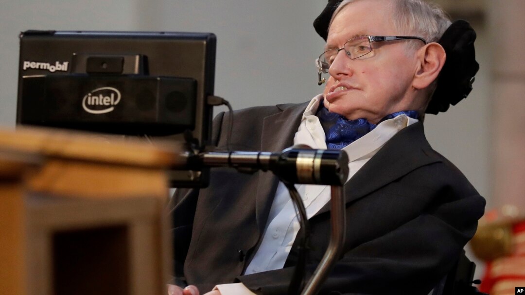 FILE - In this March 6, 2017, photo, Stephen Hawking receives the Honorary Freedom of the City of London. Cambridge University has put Hawking's doctoral thesis online, Oct. 23, 2017. 