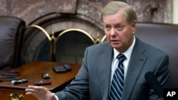 FILE - Sen. Lindsey Graham, R-S.C., speaks with reporters in the Senate Press Gallery on Capitol Hill, in Washington, Nov. 15, 2016.