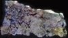 The charred remnants of a prehistoric meal on a fragment of a 6,000-year-old cooking pot. Courtesy of University of York, BioArCh)