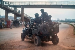 Security forces patrol the streets of Kampala, Uganda, Jan. 14, 2021.