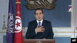 FILE - In this image made from Channel 7 Tunisia TV then-president Zine El Abidine Ben Ali is seen making a speech in Tunis, 13 Jan 2011