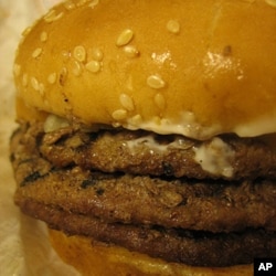 This triple burger, or sometimes a couple of 'em, constitute dinner for some folks, at 1,250 calories per. This triple burger, or sometimes a couple of 'em, constitute dinner for some folks, at 1,250 calories per.