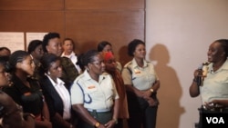 Women from militaries across the world attend the first day of an AFRICOM event in Ghana's capital, Accra. (Stacey Knott/VOA)