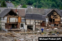 FILE - This Thursday, July 15, 2021 file photo shows destroyed houses in Schuld, Germany