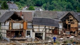 FILE - This Thursday, July 15, 2021 file photo shows destroyed houses in Schuld, Germany