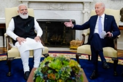 FILE - President Joe Biden meets with Indian Prime Minister Narendra Modi in the Oval Office of the White House, Sept. 24, 2021.