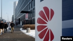 Logo of Huawei is seen on the advert in front of the local offices of Huawei in Warsaw, Poland, Jan. 11, 2019. 