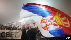 Students march on New Years Eve during a protest that erupted after a concrete canopy fell two months ago and killed 15 people in Belgrade, Serbia, Dec. 31, 2024. 