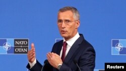 NATO Secretary-General Jens Stoltenberg speaks during a news conference after a NATO Defense Ministers meeting in Brussels, Belgium, June 26, 2019. 