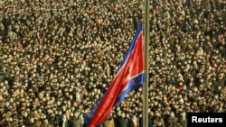 Bendera nasional Korea Utara dikibarkan di Pyongyang pada perayaan Tahun Baru, 1 Januari 2021. (Foto: KCNA/via REUTERS)
