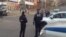 A still image from a video footage shows Interior Ministry officers block a street near a regional office of Russia's Federal Security Service (FSB), which was attacked by a gunman, in Khabarovsk, Russia, April 21, 2017. 