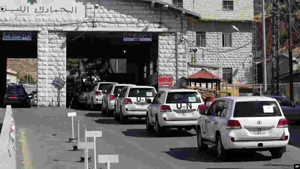 The Organization for the Prohibition of Chemical Weapons convoy prepares cross into Syria at the Lebanese border crossing point of Masnaa, Oct. 1, 2013.