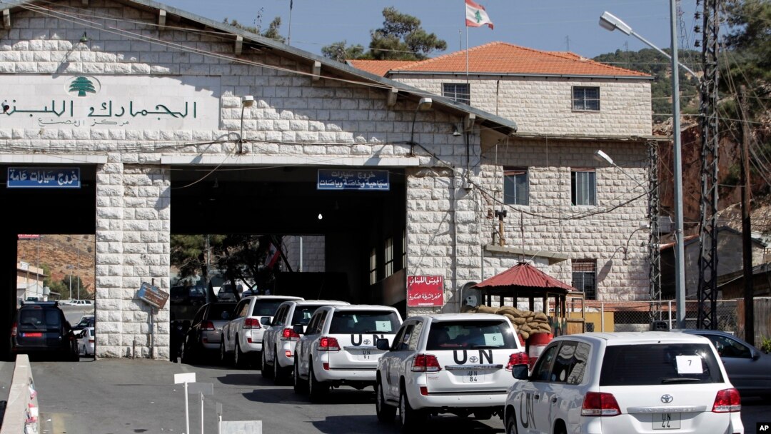 A convoy of inspectors from the Organization for the Prohibition of Chemical Weapons prepares cross into Syria at the Lebanese border crossing point of Masnaa, Oct. 1, 2013.