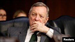 Senator Dick Durbin dalam sebuah rapat dengar pendapat di Capitol Hill, membahas usulan peningkatan keamanan sekolah setelah penembakan massal di sebuah SMU di Florida, 14 Maret 2018.