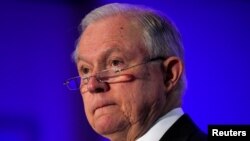 FILE - U.S. Attorney General Jeff Sessions is pictured speaking to the National Sheriffs Association Winter Conference in Washington, Feb. 12, 2018.