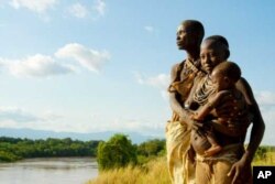 Three generations of Omo River people gaze over their beloved waterway … But their way of life is increasingly threatened, say activists