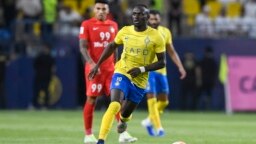 FILE — Al-Nassr's Senegalese Forward Sadio Mane dribbles the ball during the AFC Champions League playoff against Shabab Al-Ahli in Riyadh, Aug. 22, 2023. 