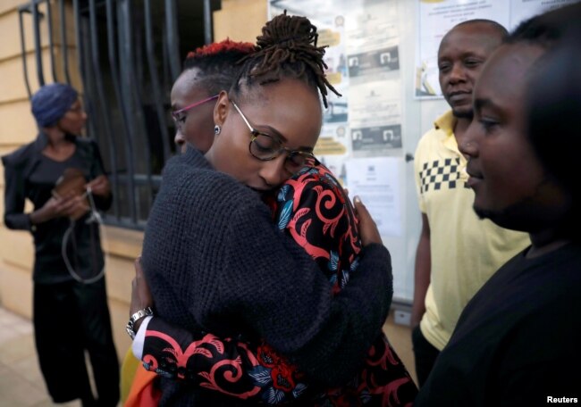 LGBT activists react after a ruling by Kenya's high court to uphold a law banning gay sex, outside the Milimani high Court in Nairobi, Kenya, May 24, 2019.