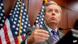 FILE - Sen. Lindsey Graham, R-S.C., speaks during a news conference on Capitol Hill, Dec. 6, 2017, in Washington. 