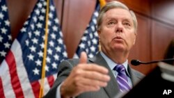 FILE - Sen. Lindsey Graham, R-S.C., speaks during a news conference on Capitol Hill, Dec. 6, 2017, in Washington. 