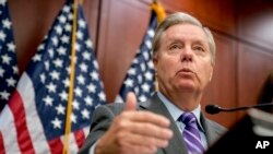 FILE - Sen. Lindsey Graham, R-S.C., speaks during a news conference on Capitol Hill, Dec. 6, 2017, in Washington. Graham on Jan. 16, 2018, urged President Donald Trump to "close this deal" on immigration reform.