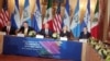 El vicepresidente de EE.UU., Mike Pence, (centro) habla en la Segunda Conferencia sobre Prosperdiad y Seguridad en Centroamérica en el Departamento de Estado en Washington el jueves, 11 de octubre de 2018.