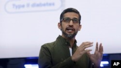 FILE - Google CEO Sundar Pichai speaks at the Google I/O conference in Mountain View, Calif., May 8, 2018.
