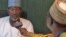 Farfesa Attahiru Jega da Ibrahim Alfa Ahmed.