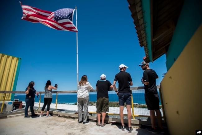 Members of Project OWL, which stands for Organization, Whereabouts, and Logistics, conduct a field test in Isabela, Puerto Rico, March 13, 2019.