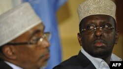 Transitional Federal Government of Somalia president Sheikh Sharif Ahmed (R), attends the meeting of the signatories of the roadmap for ending the transition in Somalia, in Nairobi on June 22, 2012.