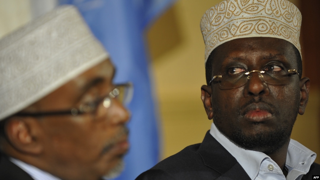 Transitional Federal Government of Somalia president Sheikh Sharif Ahmed (R), attends the meeting of the signatories of the roadmap for ending the transition in Somalia, in Nairobi on June 22, 2012.
