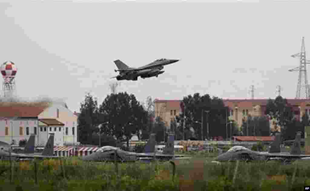 A Danish F-16 aircraft takes off from the Nato airbase in Sigonella, on the southern Italian Sicily island, March 20, 2011