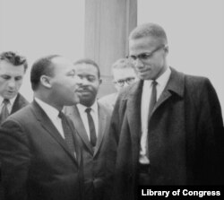 FILE - The Rev. Martin Luther King Jr., left, and Malcolm X.