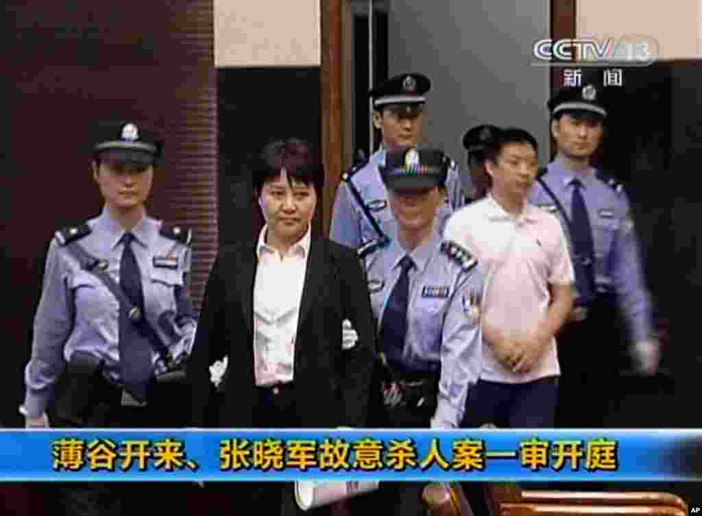 This video image taken from CCTV shows Gu Kailai, wife of Bo Xilai, being taken into the Intermediate People's Court in the eastern Chinese city Hefei, August 9, 2012. 