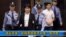 Video image from CCTV shows Gu Kailai, second from left, being taken into the Intermediate People's Court, Hefei, China, Aug. 9, 2012.