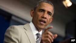 President Obama holds a press conference before a meeting with his national security team on the militant threat in Syria and Iraq.