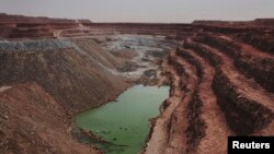 FILE: The Tamgak open air uranium mine is seen at Areva's Somair uranium mining facility in Arlit, September 25, 2013. 