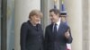 Sarkozy, Merkel Agree on Steps to Save Euro Currency Union