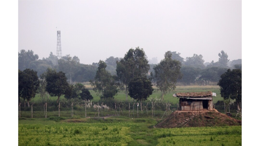 FILE - An Indian Border Security Force (BSF) bunker is seen near the fenced border with Pakistan in Suchetgarh, southwest of Jammu, Sept. 30, 2016.